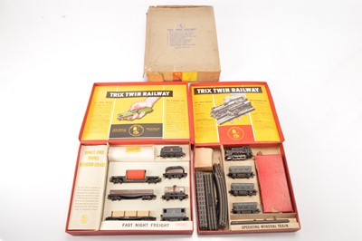 Lot 155 - Trix 00 Gauge 1/362 Fast Night Freight Set in very lightly run condition and Ore Train Set (2)