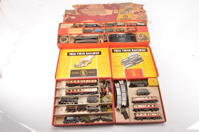 Lot 156 - Three Trix 00 Gauge Train Sets some made up with additional stock (3)