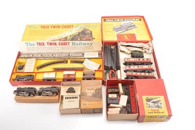 Lot 171 - Trix 00 Gauge boxed Train Sets and Whistling Signal Box and Coach whistling Set and unboxed Tank Engines (5)