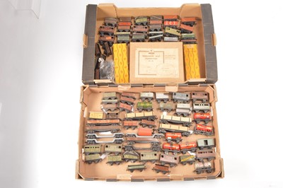 Lot 175 - Trix 00 Gauge unboxed Goods metal and plastic rolling stock and boxed Track (75 wagons and three boxes of track)