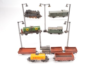 Lot 179 - Trix Express H0 Gauge unboxed Continental 0-6-0 Tank and various Goods Rolling stock and Yard Lamps (15)