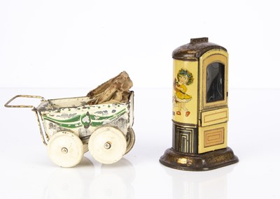 Lot 313 - A 1920-30s German chocolate dispenser saving bank