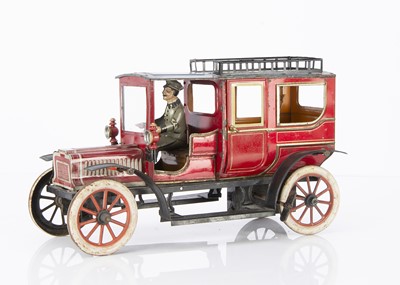 Lot 314 - A George Carette clockwork lithographed tinplate Landaulette toy automobile circa 1910