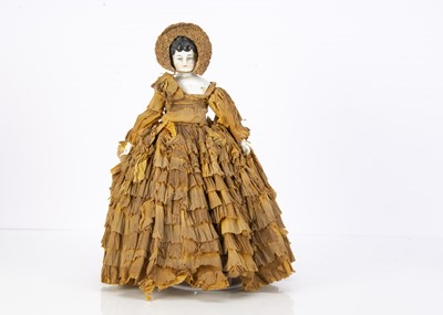 Lot 254 - A German china shoulder-head doll in crepe paper crinolines