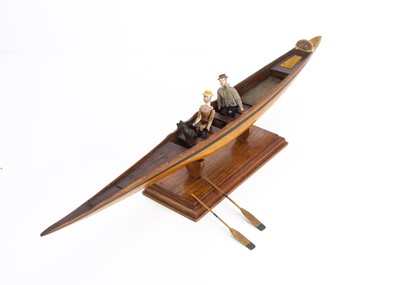 Lot 329 - A 19th century carved wooden model four man rowing skiff