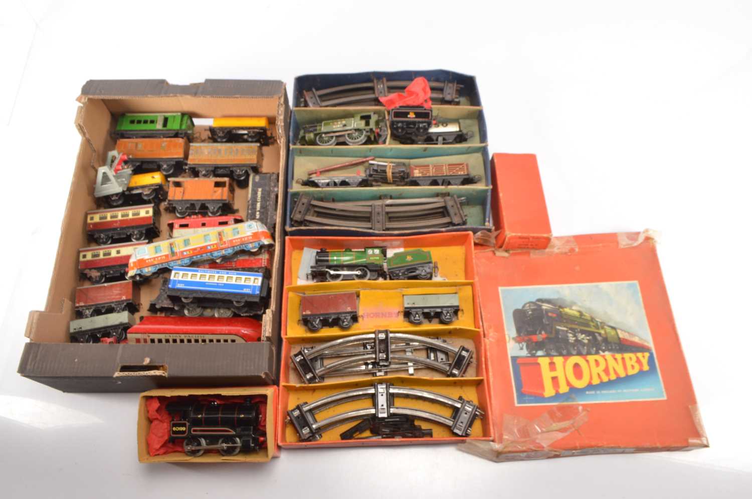 Lot 494 - Hornby 0 Gauge clockwork Train Sets Locomotives and Goods Rolling Stock and poor Marx's Train set and other items (qty)