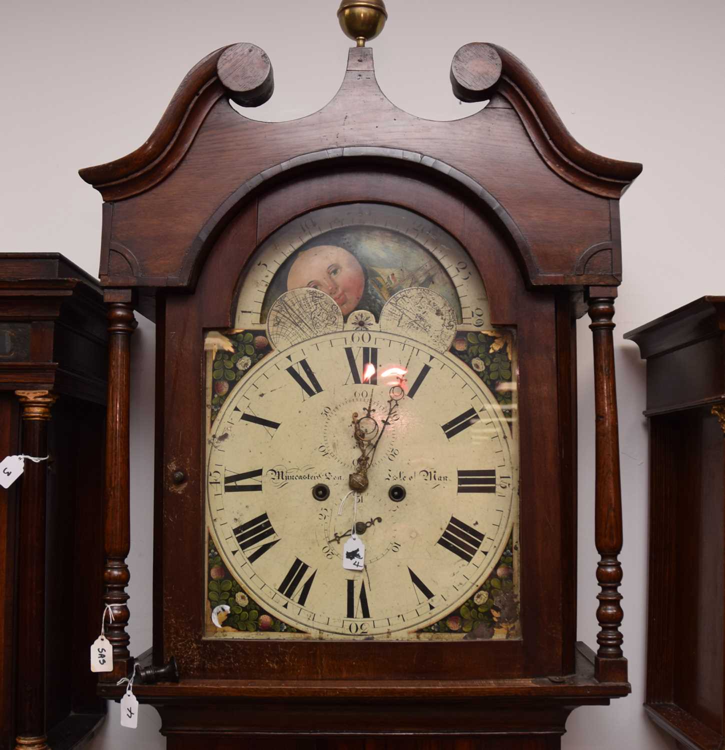 Lot 2 - An early 19th century oak and inlaid long cased clock