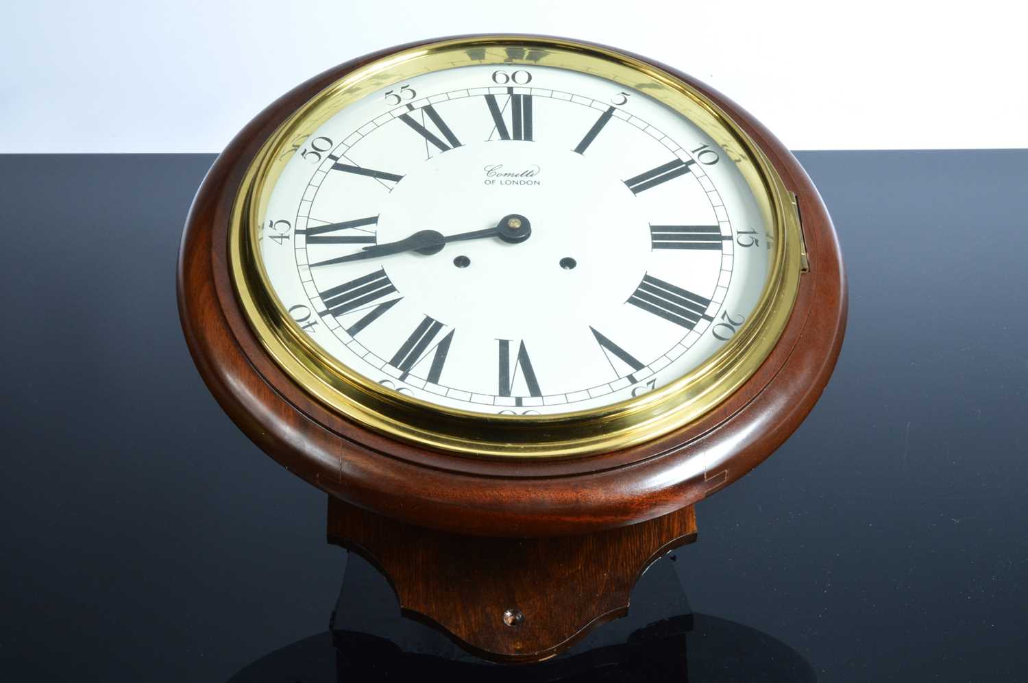 Lot 20 - A second half 20th century wall clock from Comitti of London