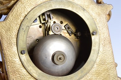 Lot 24 - A 19th century French Louis XVI style brass and porcelain mounted mantle clock