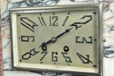 Lot 27 - An Art Deco period marble and hardstone clock and garniture