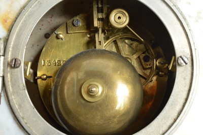 Lot 27 - An Art Deco period marble and hardstone clock and garniture