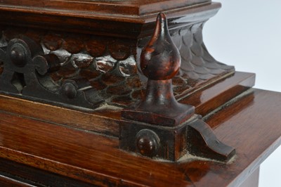 Lot 28 - A late 19th century German carved wooden mantle clock