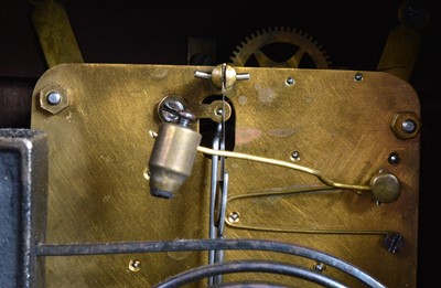 Lot 28 - A late 19th century German carved wooden mantle clock