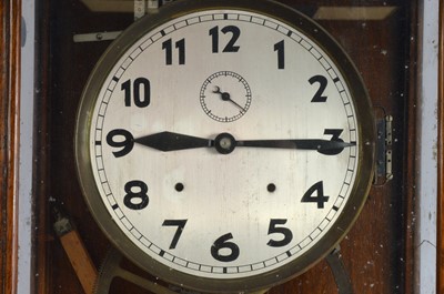 Lot 29 - A large c1930s oak cased electric wall clock