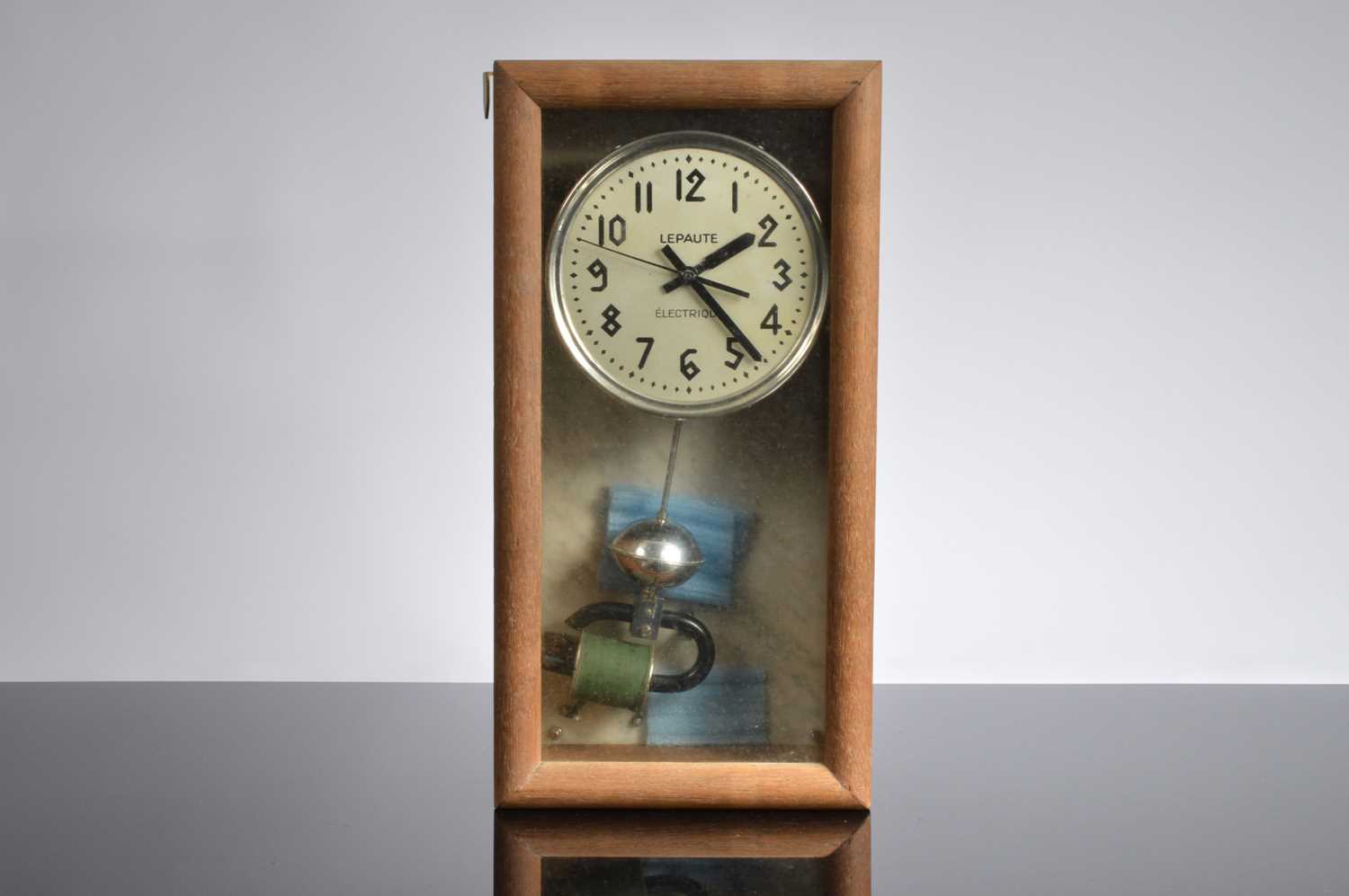 Lot 30 - A c1930s electronic wall clock by Lepaute