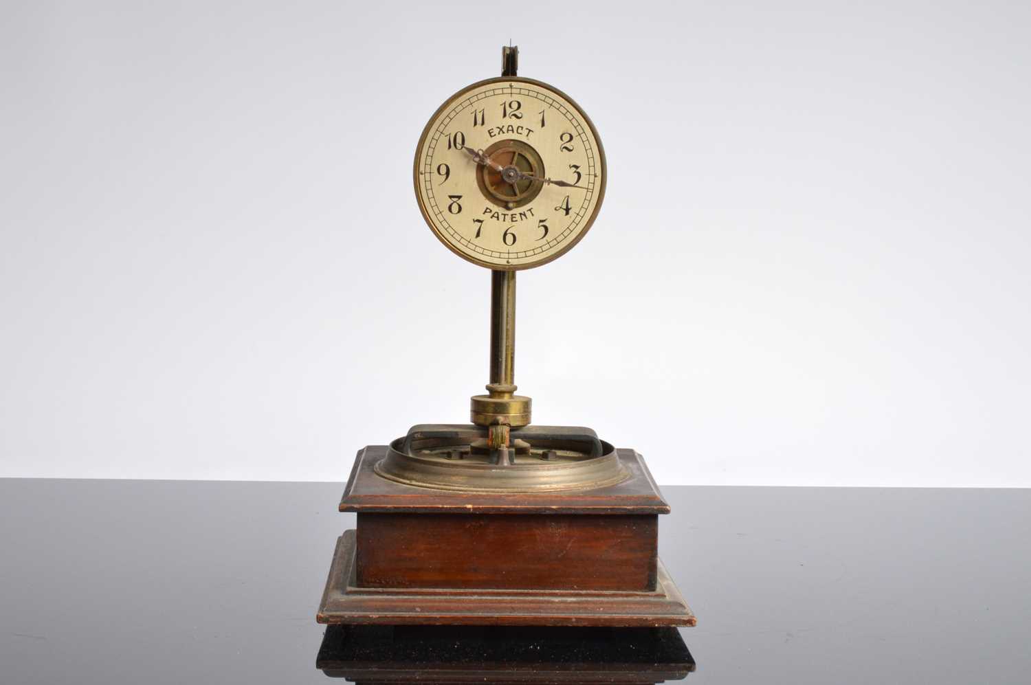Lot 36 - An interesting early 20th century Exact patent electronic mantle clock