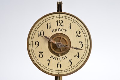 Lot 36 - An interesting early 20th century Exact patent electronic mantle clock