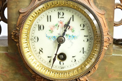 Lot 40 - A late Victorian onyx and spelter clock and garniture