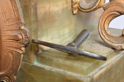 Lot 40 - A late Victorian onyx and spelter clock and garniture