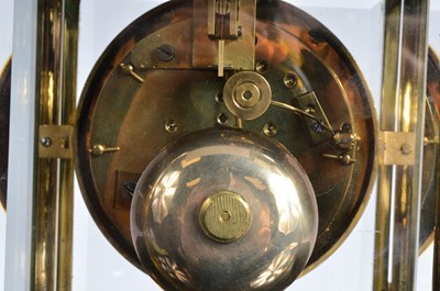 Lot 43 - A modern brass and glazed mantle clock