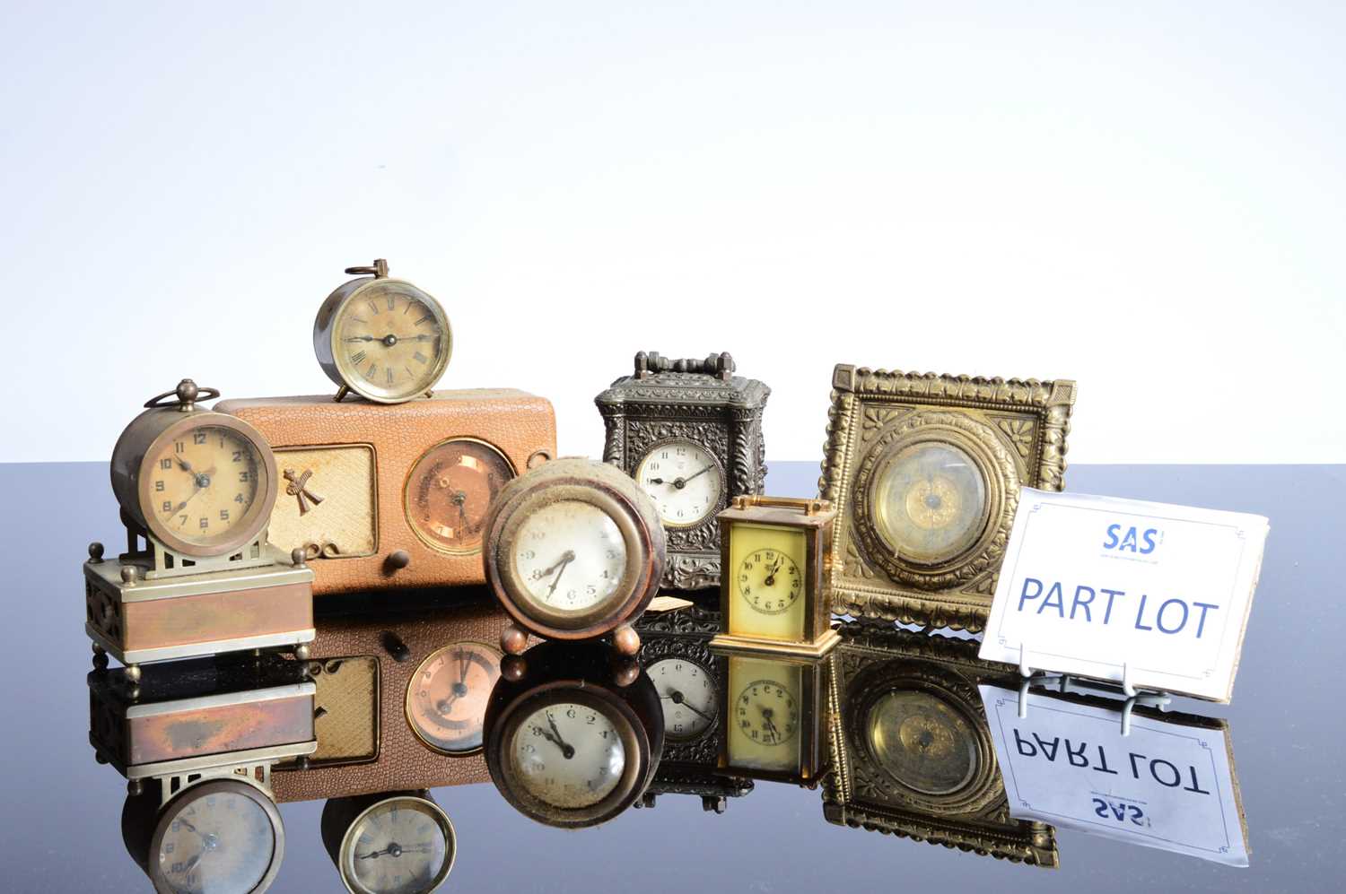 Lot 54 - A collection of fourteen travel and other timepieces