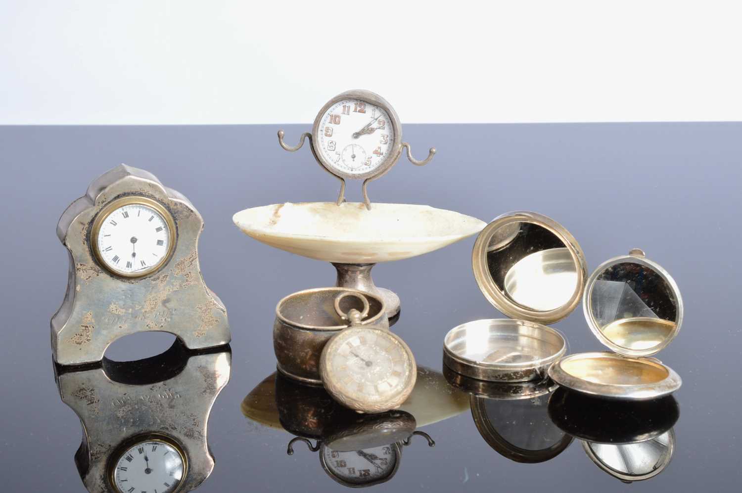 Lot 57 - Two small silver mounted clocks and other items