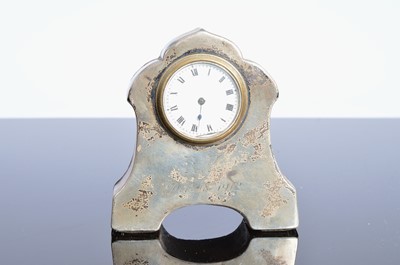 Lot 57 - Two small silver mounted clocks and other items