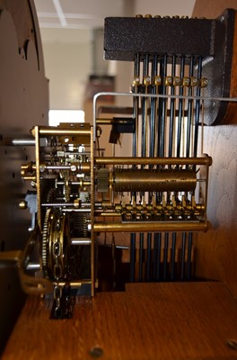 Lot 59 - A second half 20th century short oak long case clock