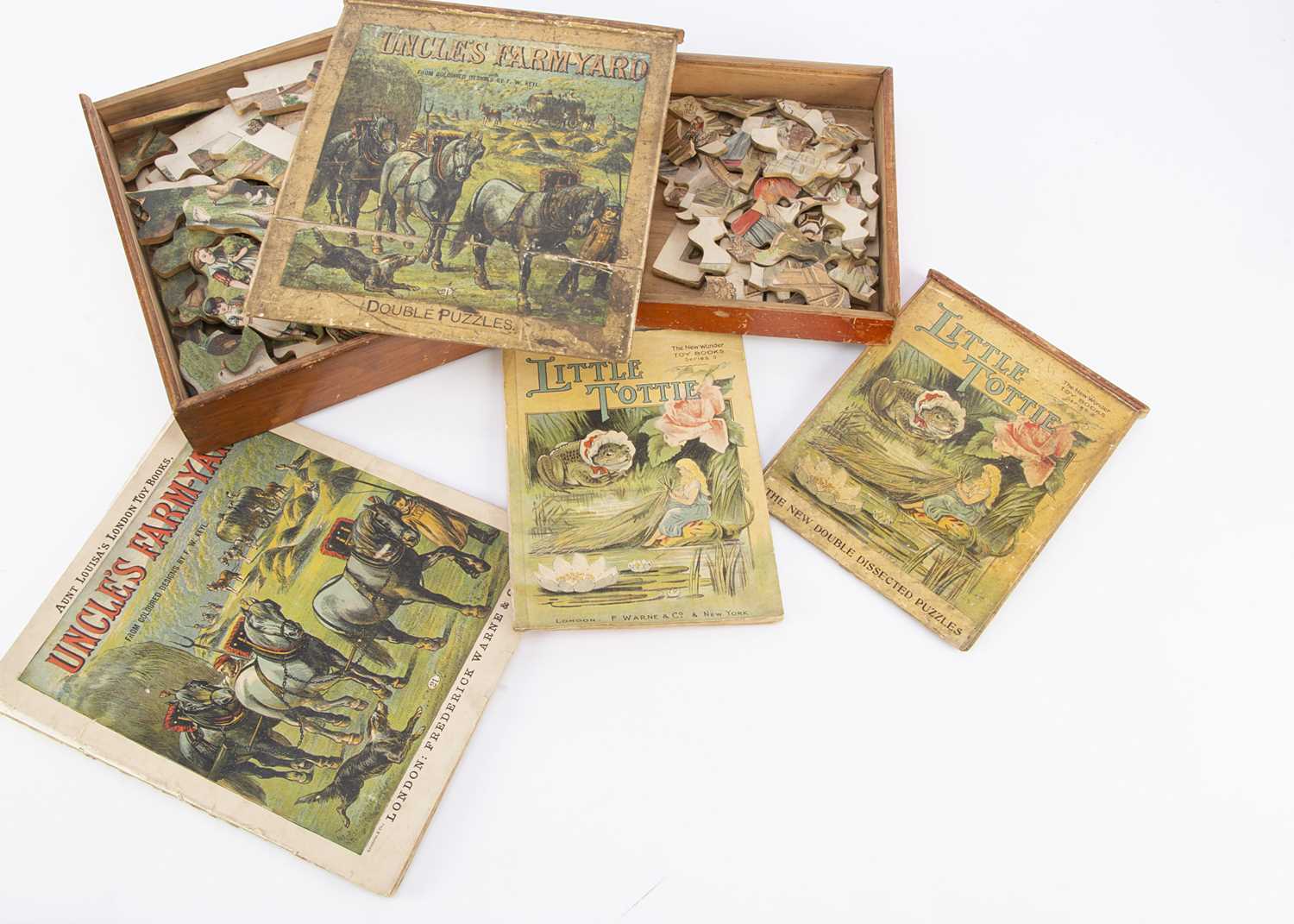 Lot 372 - Two early 20th century Frederick Warne & Co dissected wooden puzzle