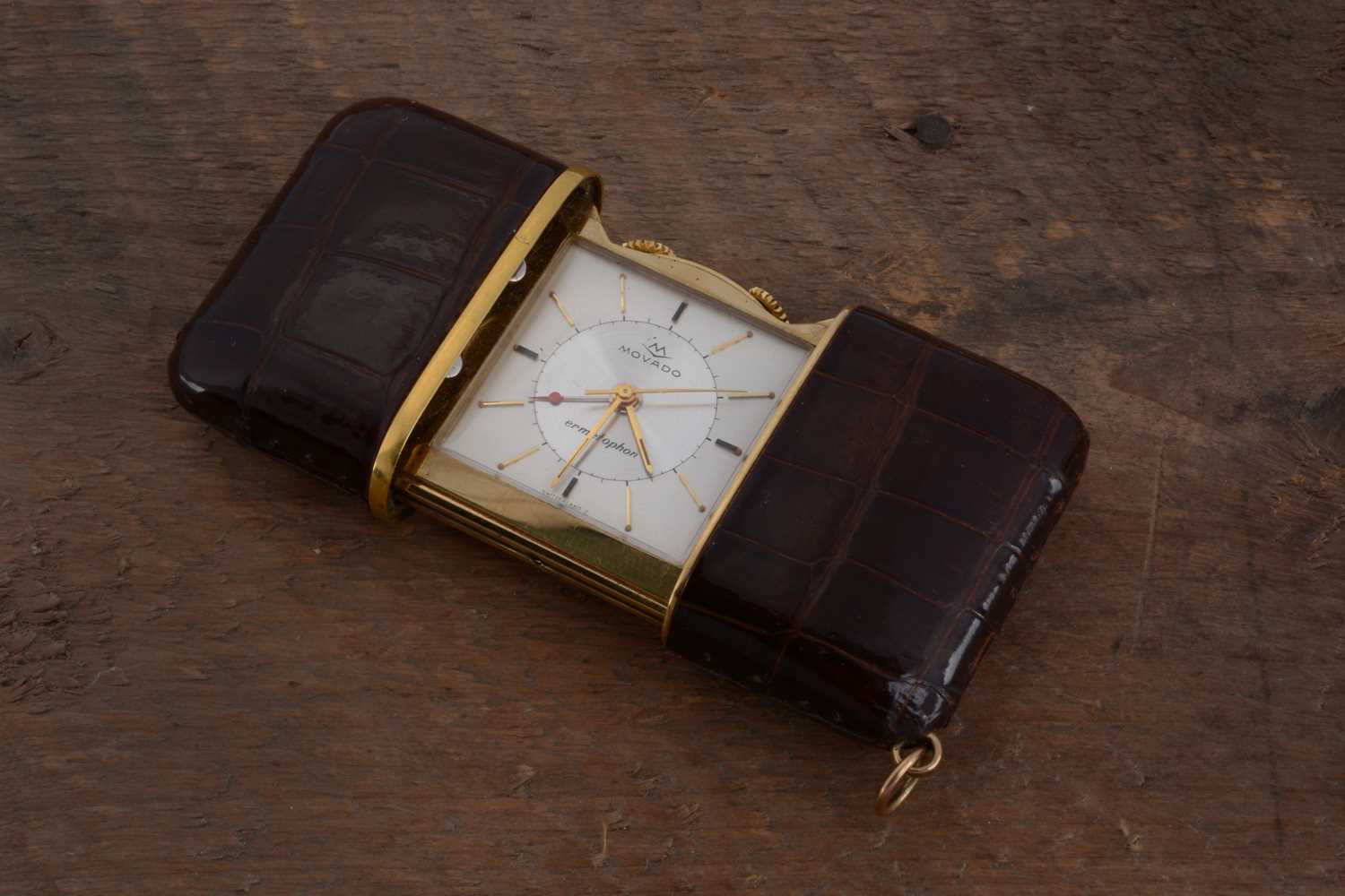 Lot 70 - A c1950s Movado Ermetophon gold plated purse alarm clock