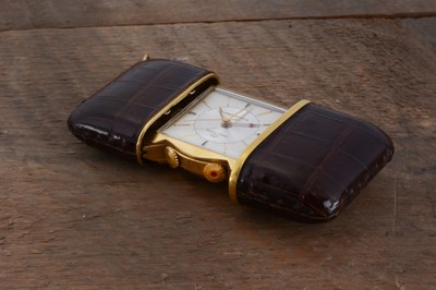 Lot 70 - A c1950s Movado Ermetophon gold plated purse alarm clock