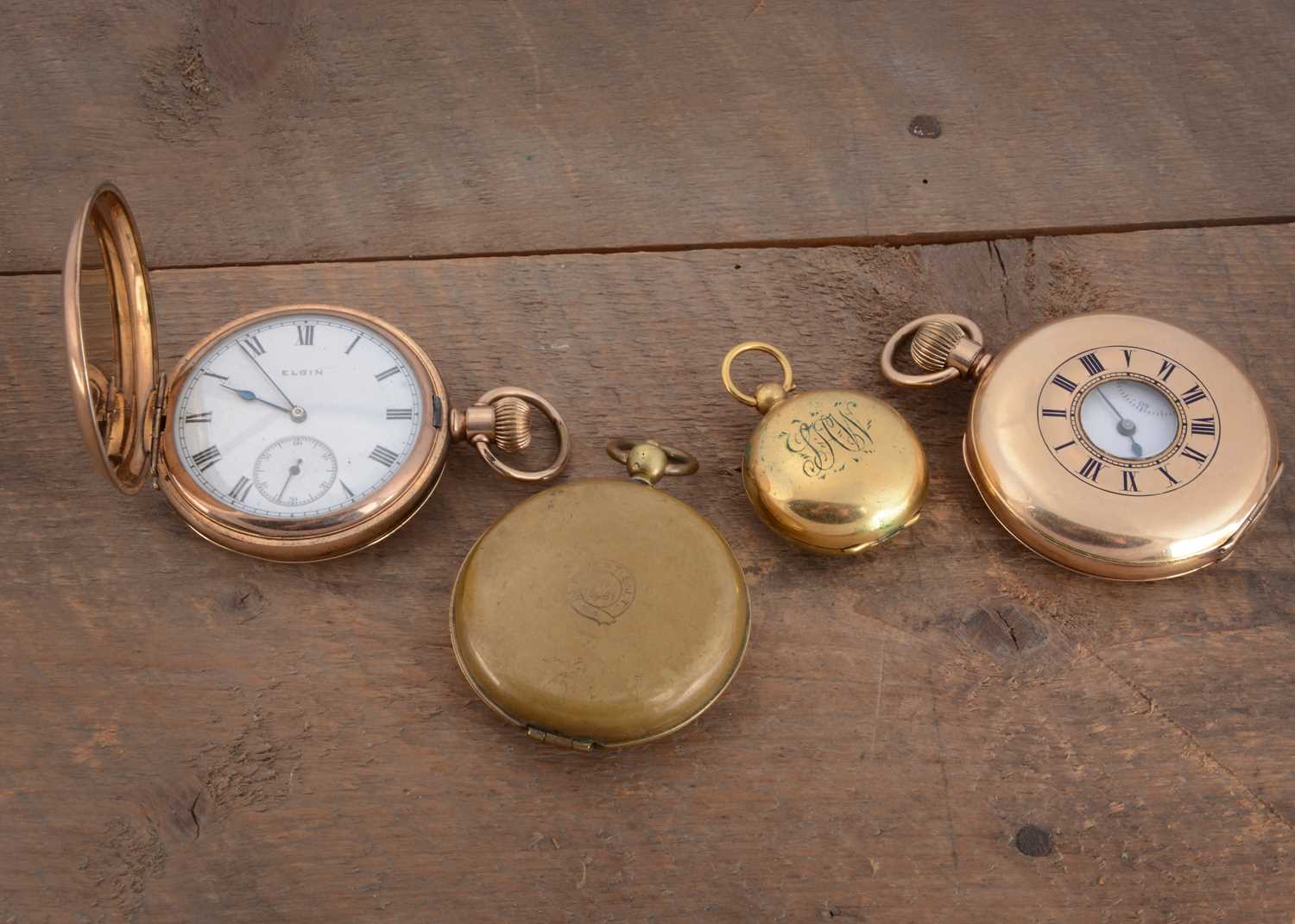 Lot 74 - Two gold plated pocket watch and a sovereign case and a travel beaker