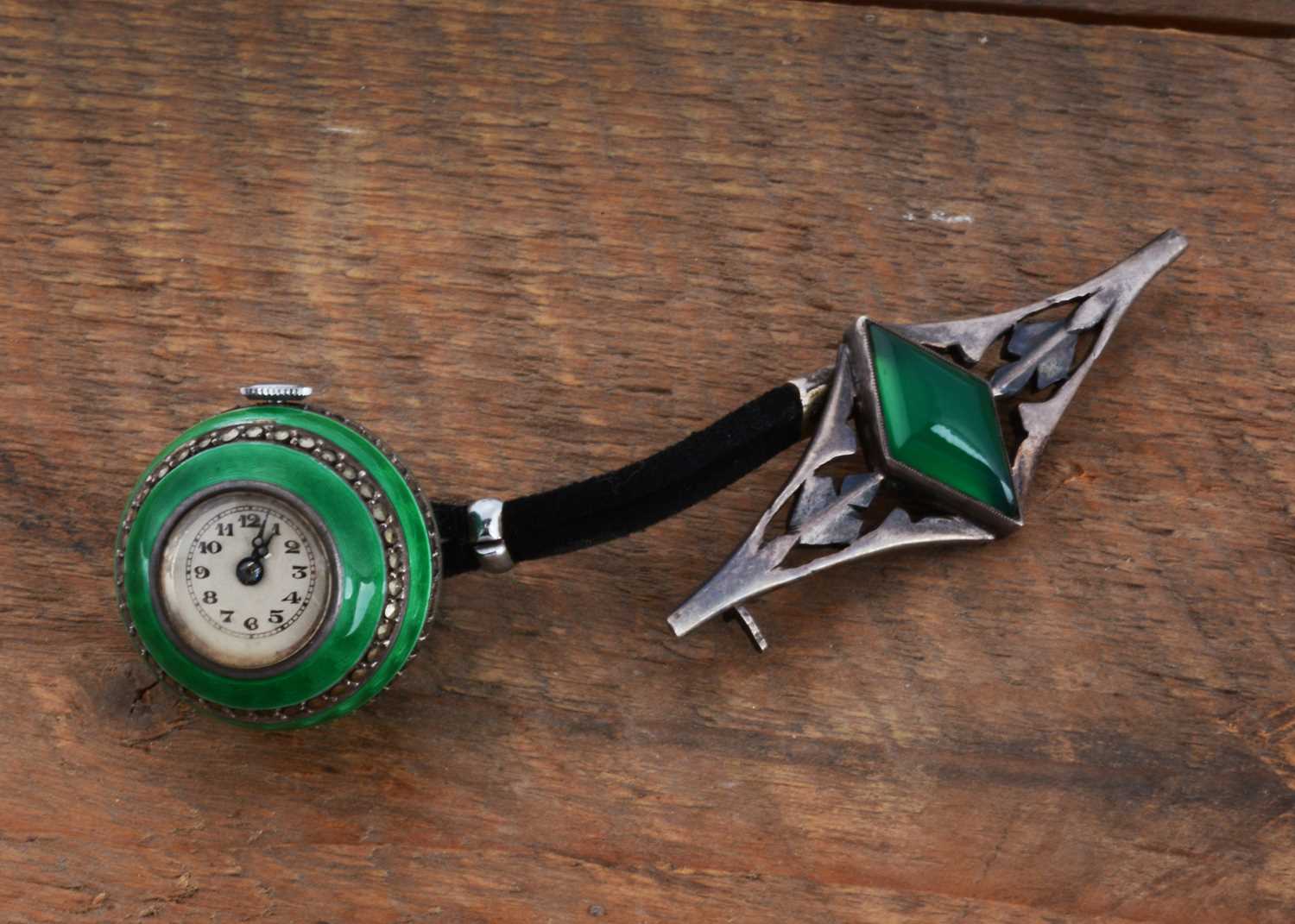 Lot 75 - An Art Deco silver and enamelled manual wind lady's spherical fob watch by J. Grevere