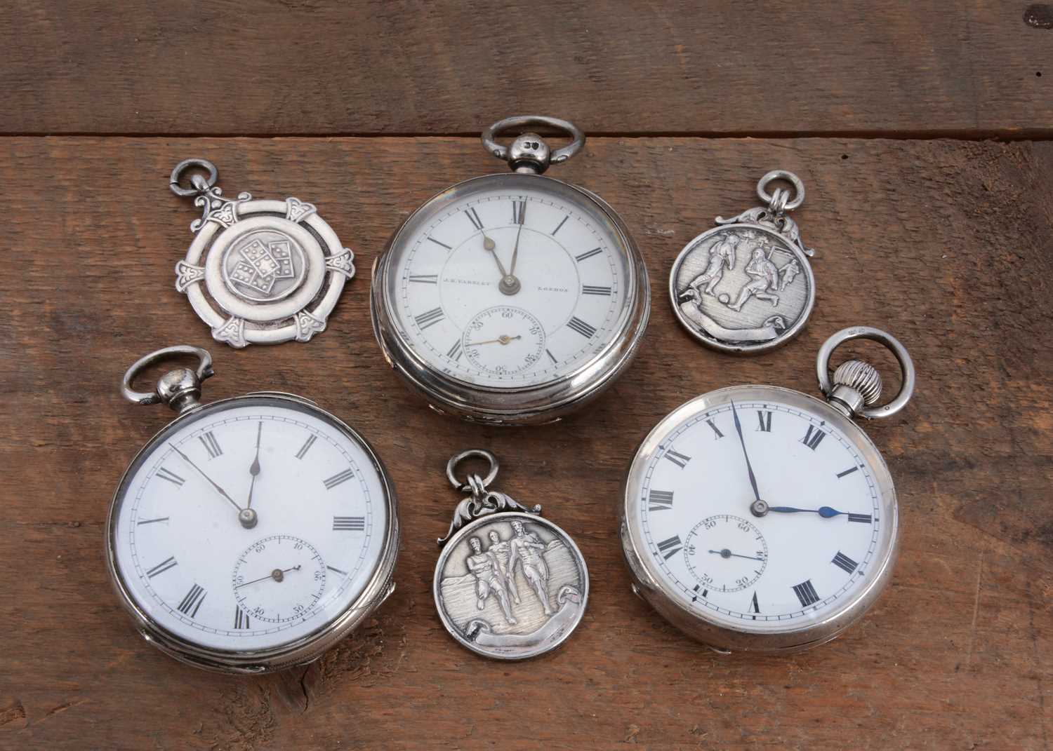 Lot 82 - Three Victorian and later silver open faced pocket watches and three silver fobs