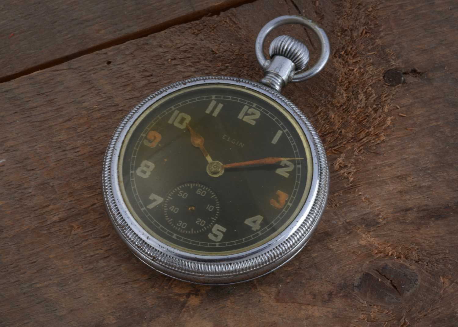Lot 94 - A WWII period Elgin open face pocket watch