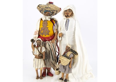 Lot 258 - Four North African leather dolls