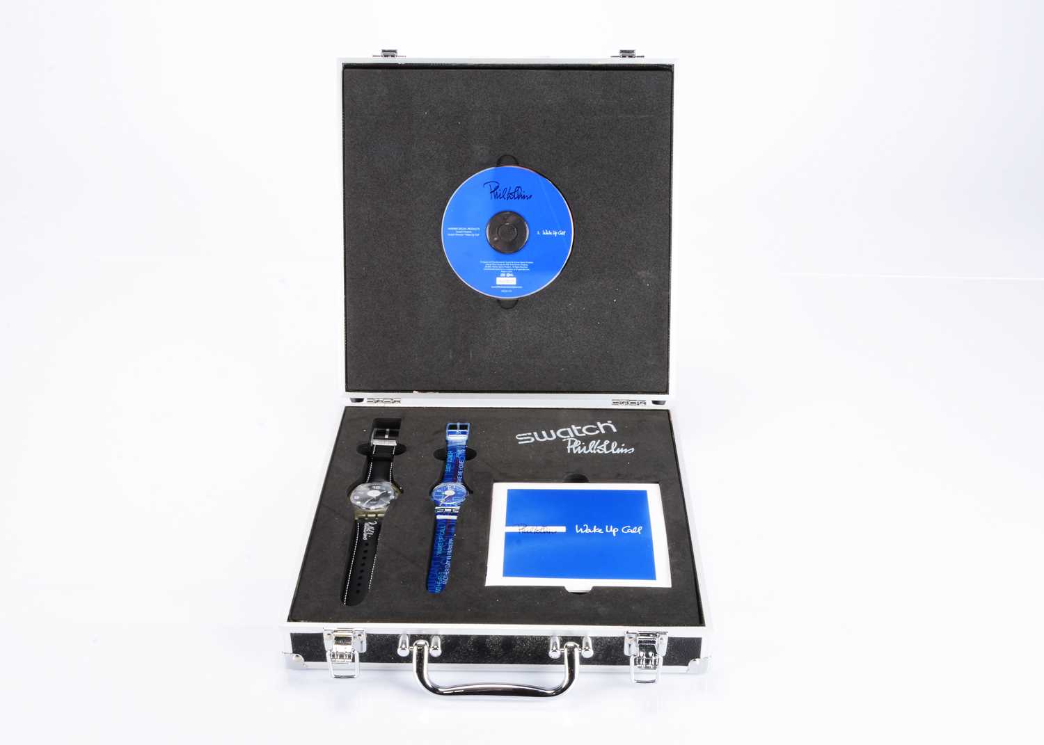 Lot 119 - A limited edition Swatch watch Phil Collins "Wake Up Call" set
