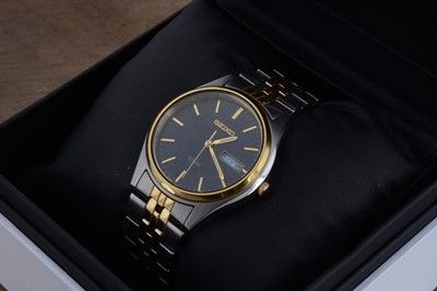 Lot 126 - A modern Seiko Solar stainless steel and gold plated wristwatch