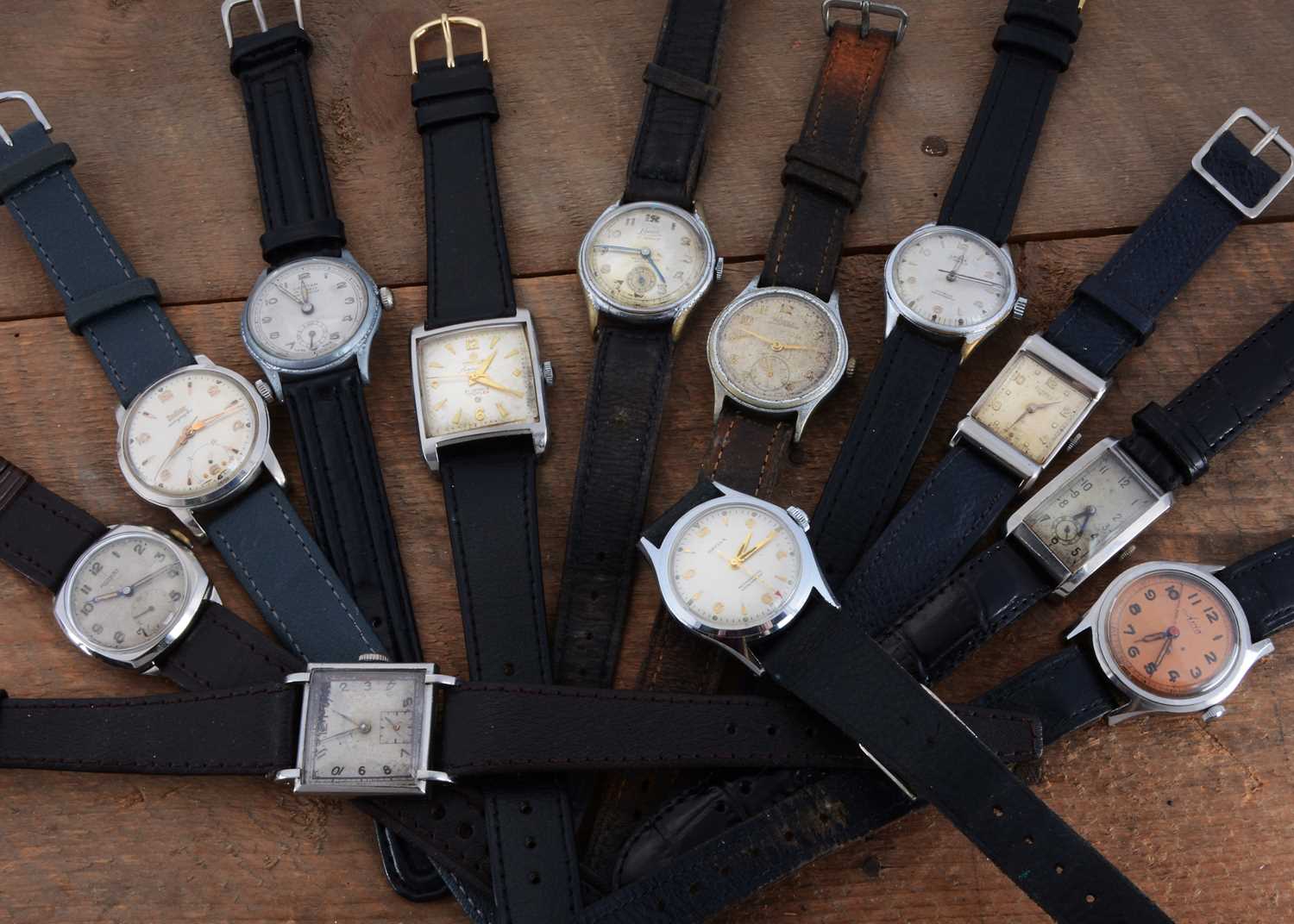 Lot 167 - Twelve vintage mid-sized manual wind wristwatches