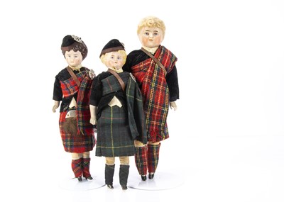 Lot 259 - Three Scottish boy bisque shoulder-head dolls