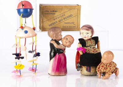 Lot 389 - Celluloid clockwork toys