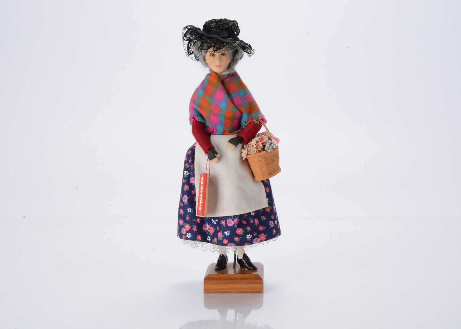 Lot 141 - An Ann Parker artist doll modelled after a Victorian flower seller