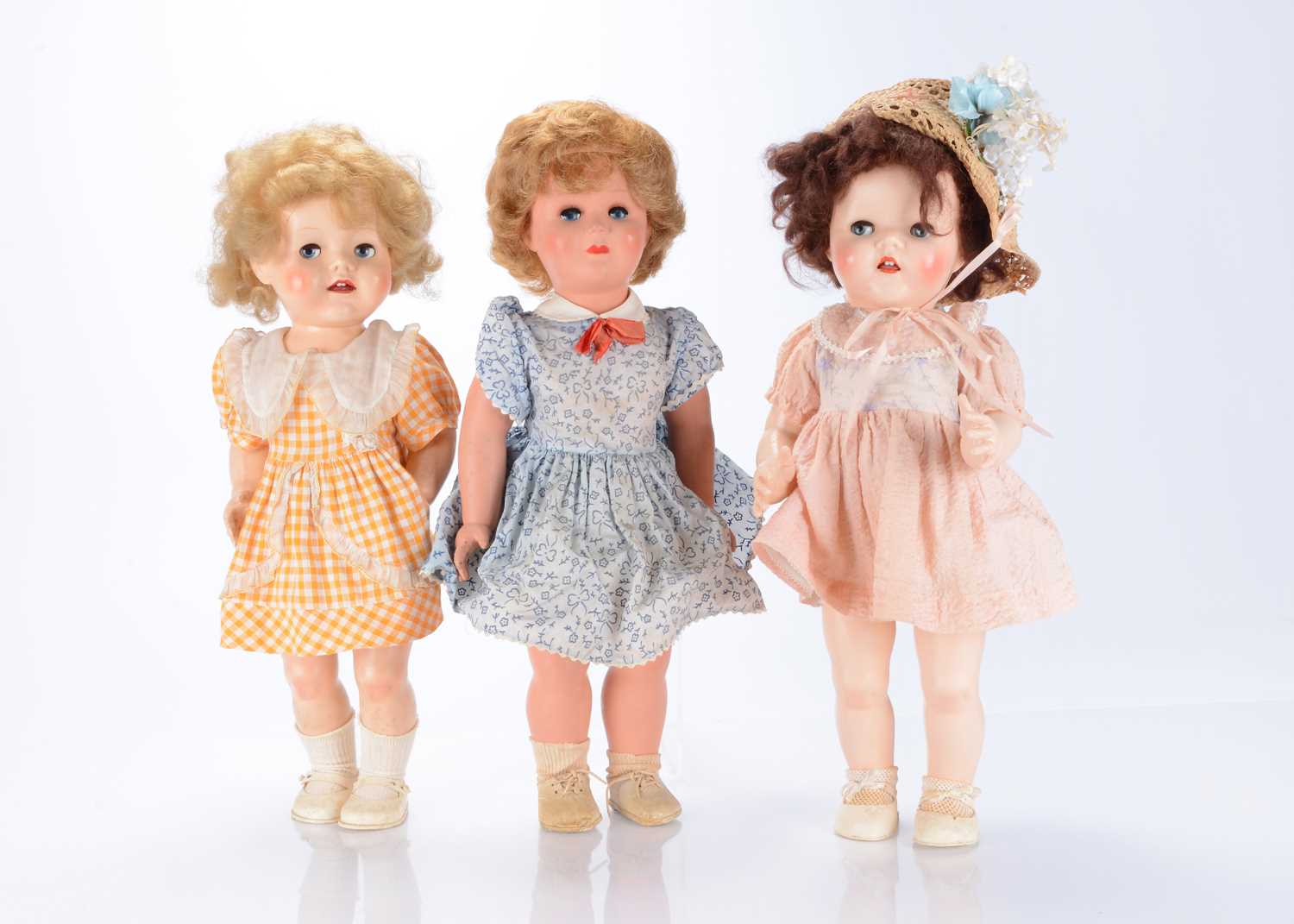 Lot 166 - Three post-war hard plastic dolls