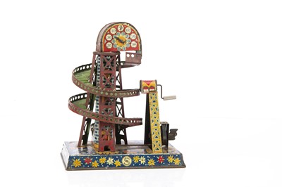 Lot 424 - A 1920s Japanese clockwork lithographed tinplate fairground Ball Escalator tower