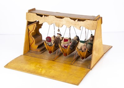 Lot 434 - A late 19th century toy swing boat ride
