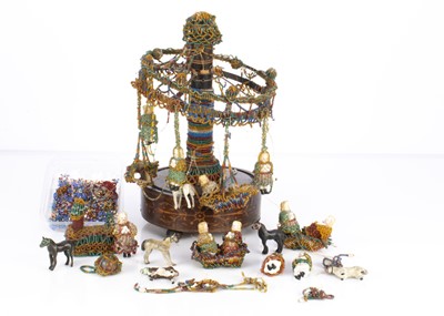 Lot 436 - An unusual 19th century beadwork musical carousel