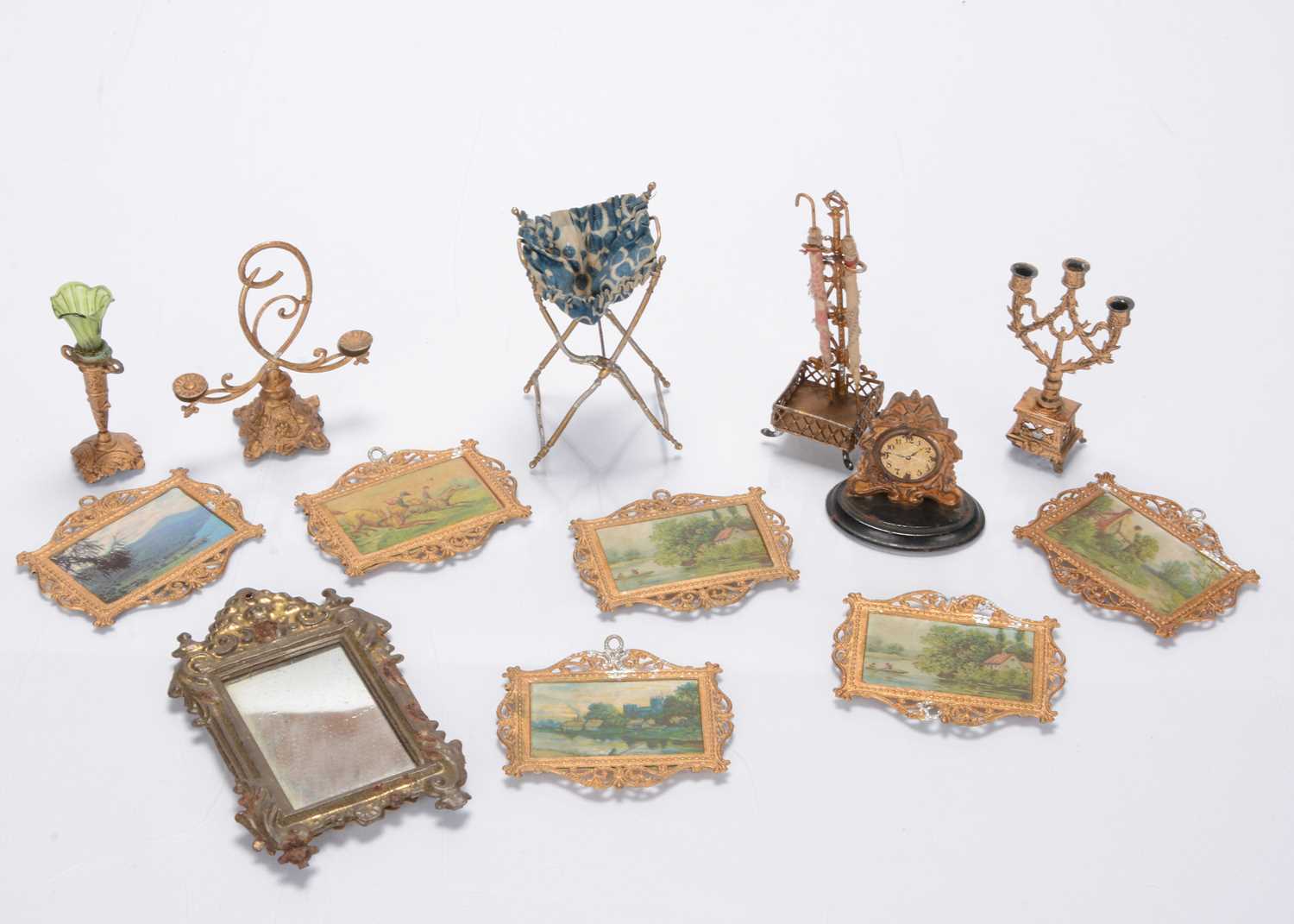 Lot 484 - Gilt metal dolls' house chattels