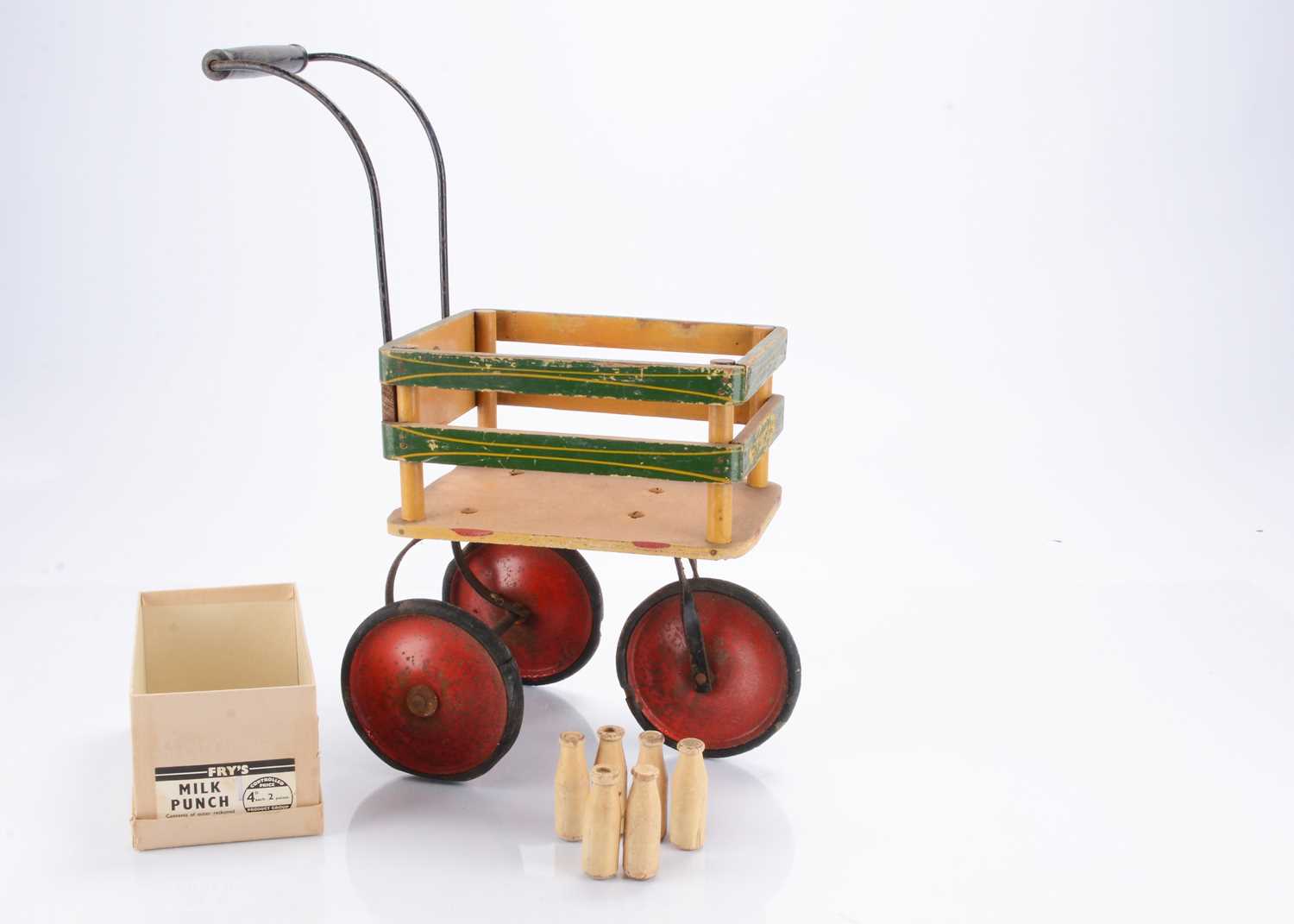Lot 510 - A Tri-ang push-along milk trolley