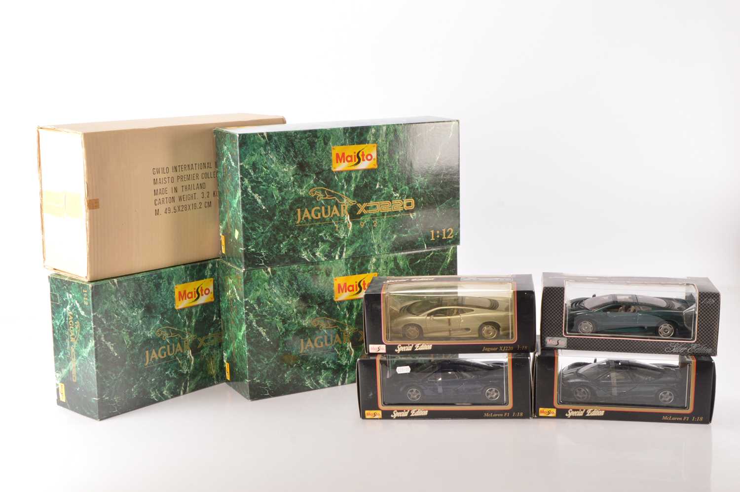 Lot 154 - Maisto 1:12 Scale and 1:18 scale Jaguars and McLaren (8)