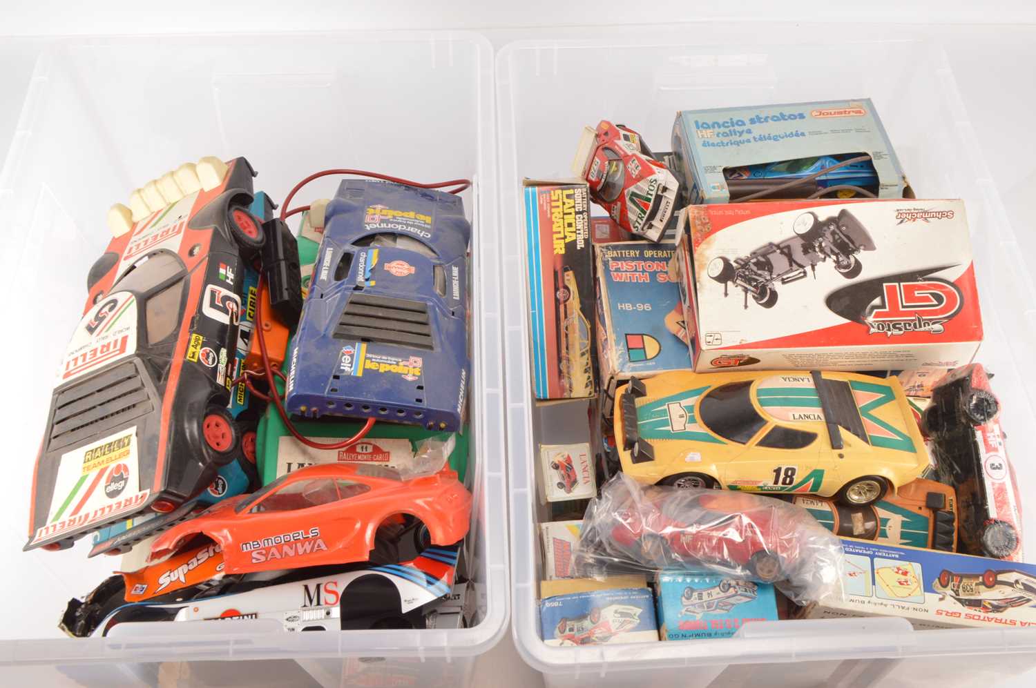 Lot 604 - Large collection of Radio and battery control box Controlled mostly Lancia Cars various scales (qty in two large plastic boxes)